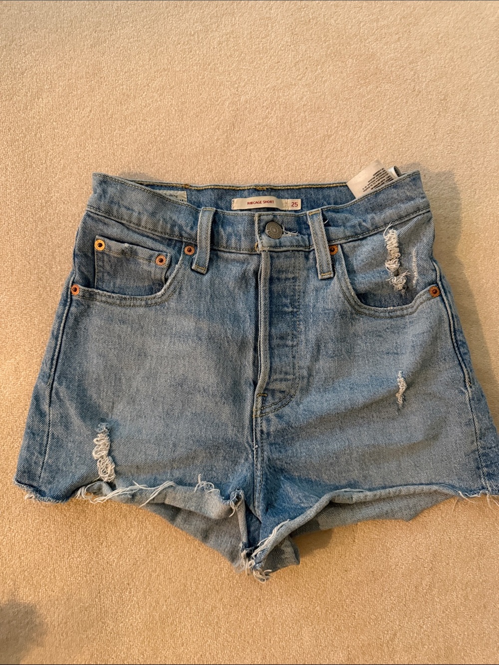 Levi’s High-Rise Ribcage Distressed Denim Shorts - Light Blue